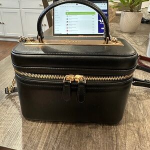 Black Handbag with Gold Accents